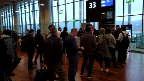 Flight passengers in a queue to board the plane in Dalaman Airport, Dalaman Stock Footage 128202554