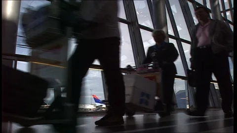 FLIGHT PASSENGERS IN THE TRANSIT HALL Stock-Footage 97238593