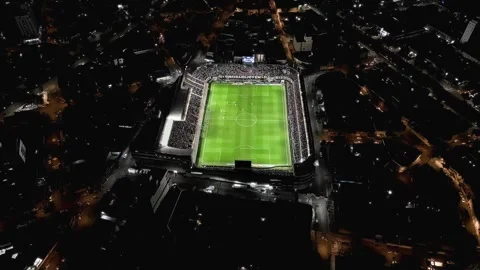 Flight passing over the field of the Santos Futebol Clube football stadium. Stock Footage 245860040