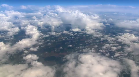 Flight on plane over pretty fluffy clouds Video stock 41462992