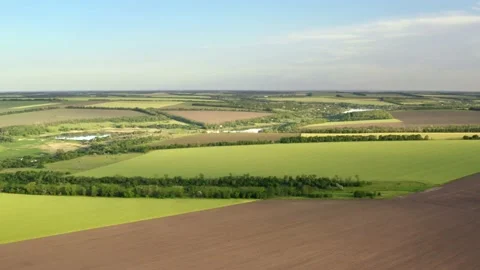 Flight of a quadcopter at high altitude over countryside landscape. Stock Footage 133584409