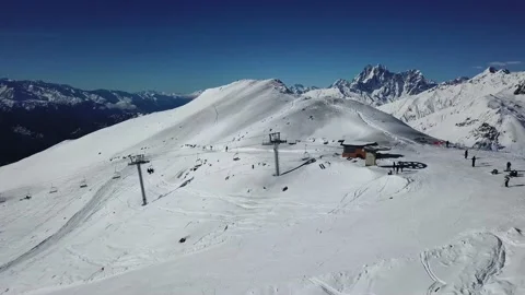 Flight on a quadcopter over a cable mountain road Stock Footage 154394403