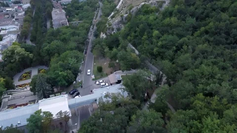 Flight on a quadcopter over the mountain at sunset in Pyatigorsk. Stock Footage 158817902