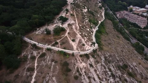 Flight on a quadcopter over the mountain at sunset in Pyatigorsk. Stock Footage 158818119