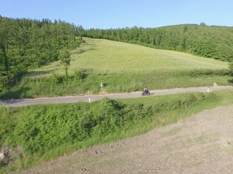 Flight on the road tracking the bike Stock Footage 72216902