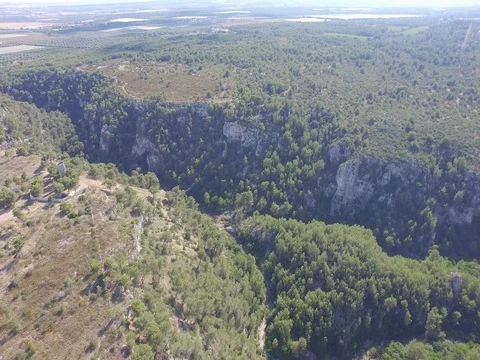 Flight on the rock wall of a small town Stock Footage 72367079
