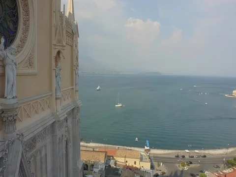 Flight from the sea to the facade of the cathedral Stock Footage 72329468