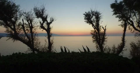 Flight to the sea at sunset. Video stock 60768489