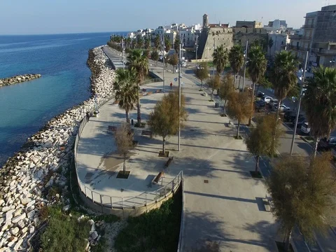 Flight from the seafront towards the city Stock Footage 72453924
