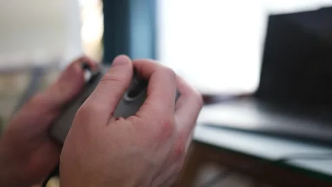 Flight simulator concept. Male hands hold the joystick from the fpv drone Stock Footage 330358047
