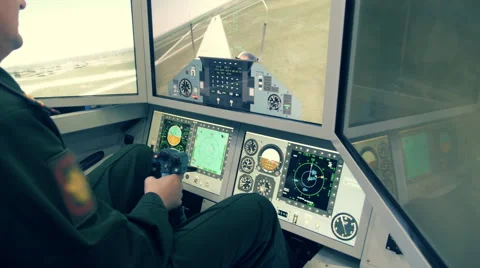 On flight simulator pilot by joystick controls the flying helicopter Stock Footage 68354220