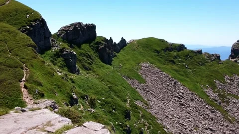In flight skimming the rocks towards the summit Stock Footage 134007781