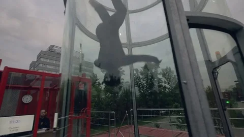 Flight skydiver in training wind tunnel. Flying in a wind tunnel. Indoor sky Stock Footage 78882064