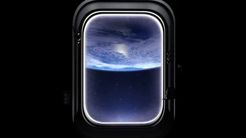 The flight of the spaceship over the Earth. View of Earth through the window of Stock Footage 74850958