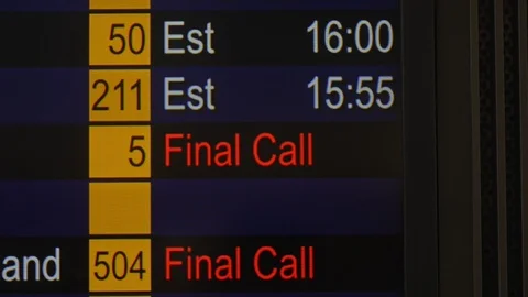 Flight status and time on information board in interior of asian international Stock Footage 119989421