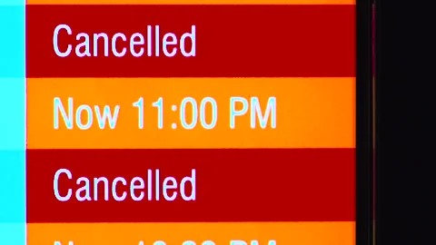 Flight Status Board Filled with Delayed and Cancelled Notices Stock Footage 316826645