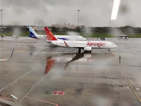 Flight stranded during rain and bad weather Stock Photos