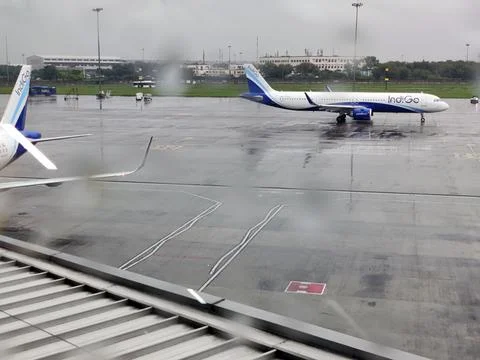 Flight stranded during rain and bad weather Stock Photos