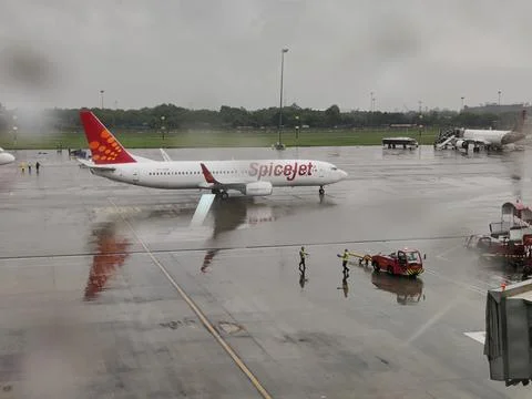 Flight stranded during rain and bad weather Stock Photos