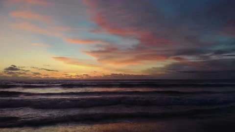 Flight at sunset overlooking the Indian Ocean in Bali Indonesia. Stock Footage 145894404