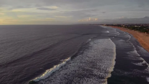Flight at sunset overlooking the Indian Ocean in Bali Indonesia. Stock Footage 145894533