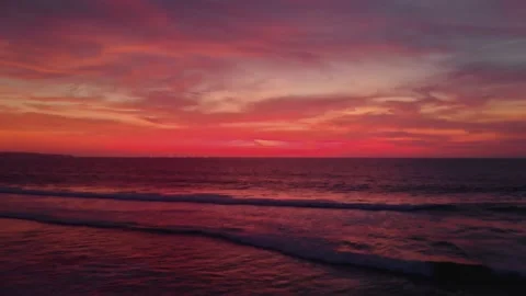 Flight at sunset overlooking the Indian Ocean in Bali Indonesia. Stock Footage 145894667