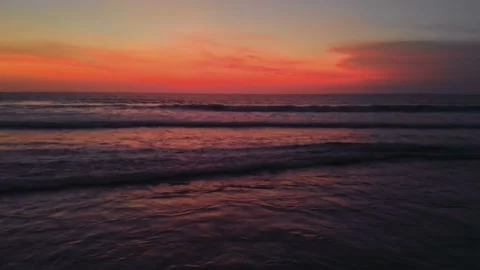Flight at sunset overlooking the Indian Ocean in Bali Indonesia. Stock Footage 145894829