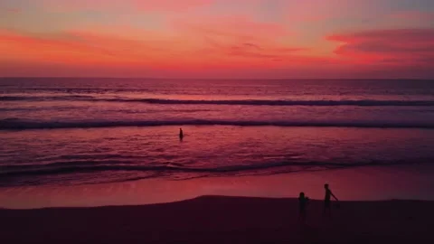 Flight at sunset overlooking the Indian Ocean in Bali Indonesia. Stock Footage 145895038