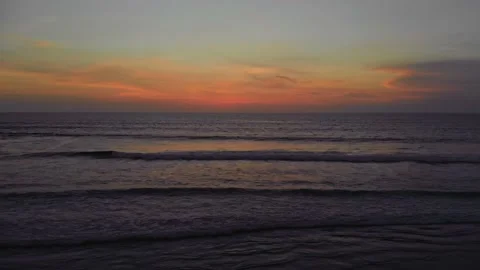 Flight at sunset overlooking the Indian Ocean in Bali Indonesia. Stock Footage 145895085