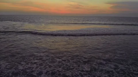 Flight at sunset overlooking the Indian Ocean in Bali Indonesia. Stock Footage 145895340