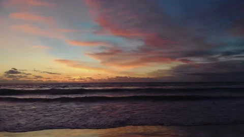 Flight at sunset overlooking the Indian Ocean in Bali Indonesia. Stock Footage 145895370