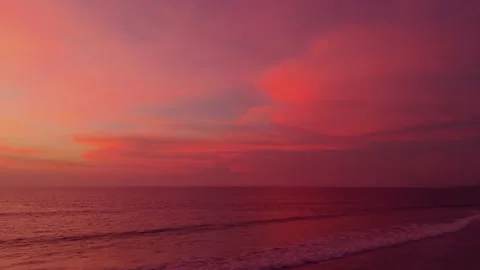 Flight at sunset overlooking the Indian Ocean in Bali Indonesia. Stock Footage 145896325