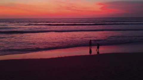 Flight at sunset overlooking the Indian Ocean in Bali Indonesia. Stock Footage 145896808