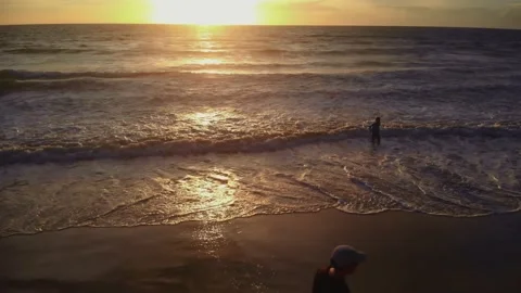 Flight at sunset overlooking the Indian Ocean in Bali Indonesia. Stock Footage 145897114