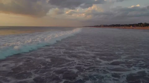 Flight at sunset overlooking the Indian Ocean in Bali Indonesia. Stock Footage 145897253