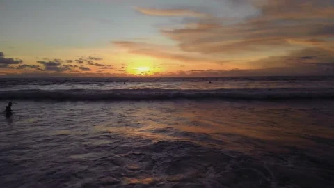 Flight at sunset overlooking the Indian Ocean in Bali Indonesia. Stock Footage 145897277