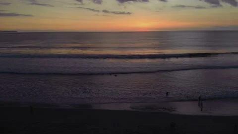 Flight at sunset overlooking the Indian Ocean in Bali Indonesia. Stock Footage 145897429