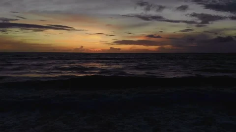 Flight at sunset overlooking the Indian Ocean in Bali Indonesia. Stock Footage 146245179