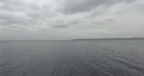 Flight on the surface of the water away from the island 스톡 동영상 101252483