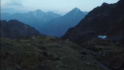 Flight in Swiss mountains with a view far away Stock Footage