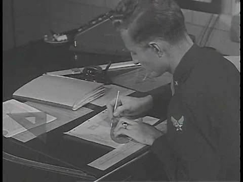 A flight test engineer checks the test results and the pilot lands the plane Stock Footage 75202622
