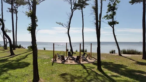 Flight through beach house porch fire pit and beach Machipongo Virginia 스톡 동영상 280447647