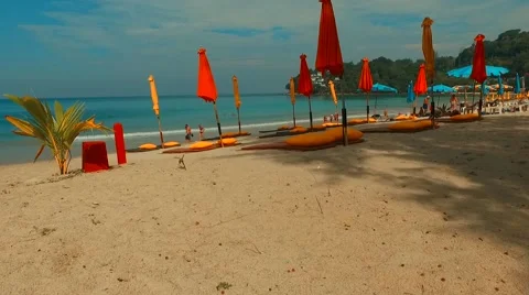 Flight through the beach umbrellas. Phuket. Thailand. Stock Footage 68726411