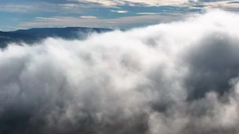 Flight through the Clouds 09 | Mountains | Fog &amp; Low Clouds | 4K Drone Stock Footage 259858971
