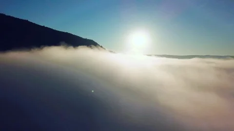 Flight through the clouds above the river Stock-Footage 106675477