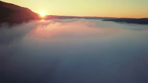 Flight through the clouds above the river Video stock 119230737