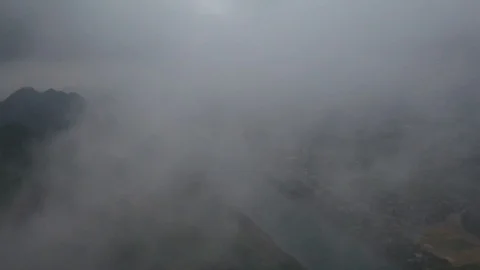 Flight Through the Clouds Reveals Beautiful Vietnam Mountains River and City Stock Footage 125502355