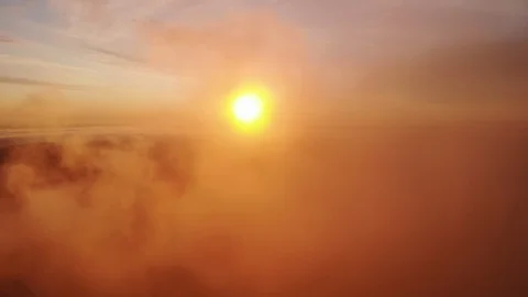 Flight through clouds at sunrise aerial drone shot Stock Footage 109960714