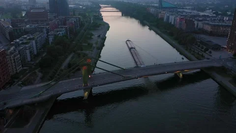 Flight through Frankfurt am Main, on the river Main A ship passes under a bridge Stock Footage 234070840
