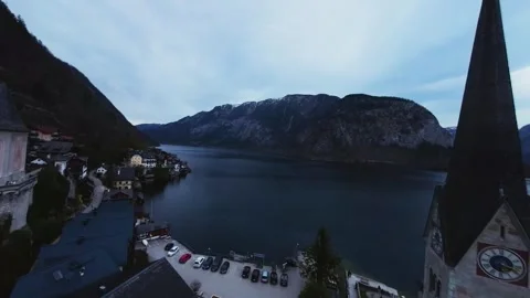 Flight through Hallstatt with the two famous churches Stock Footage 277619764
